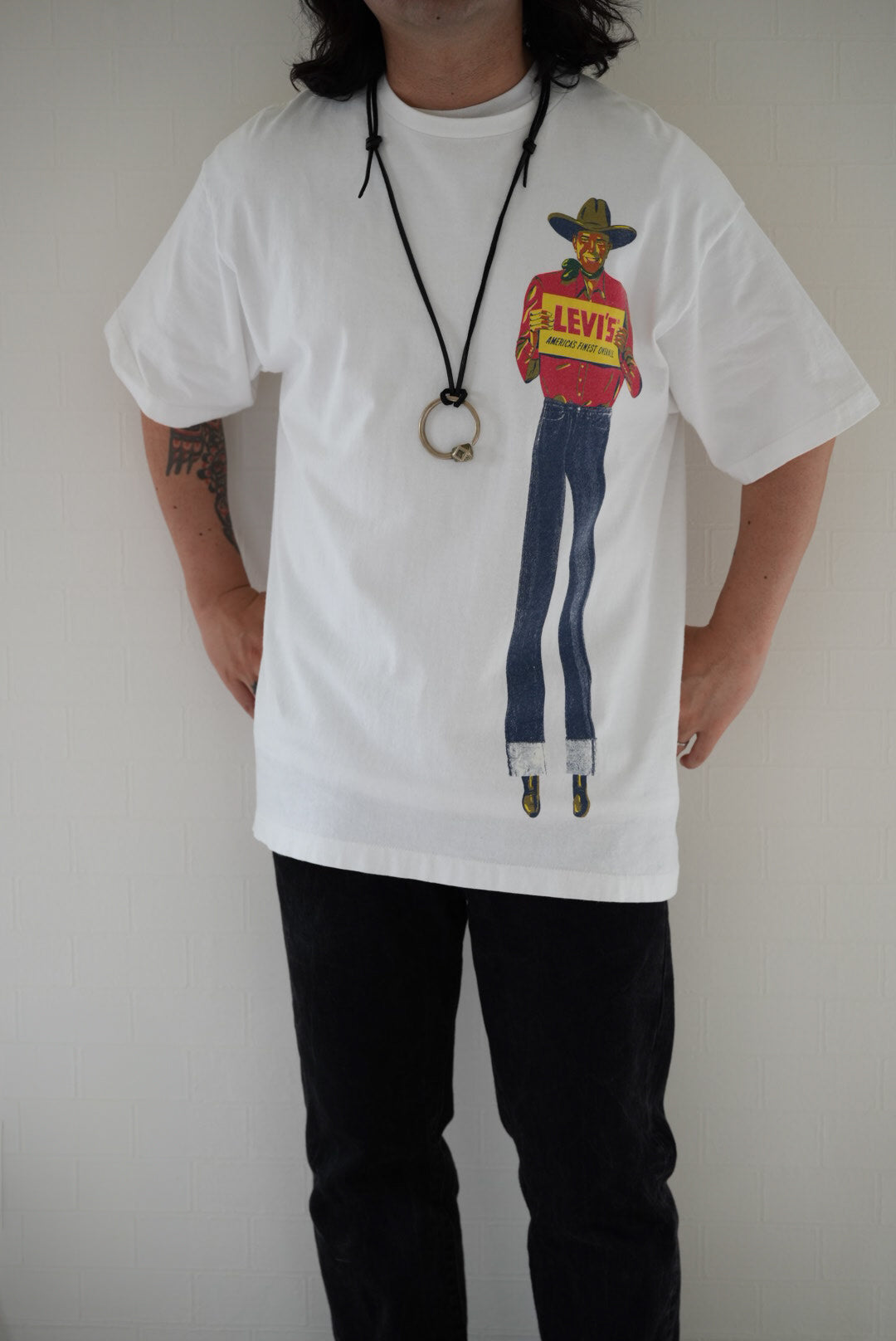 90's Levi's AMERICA'S FINEST OVERALL Saddle Man print T-shirt made in USA.